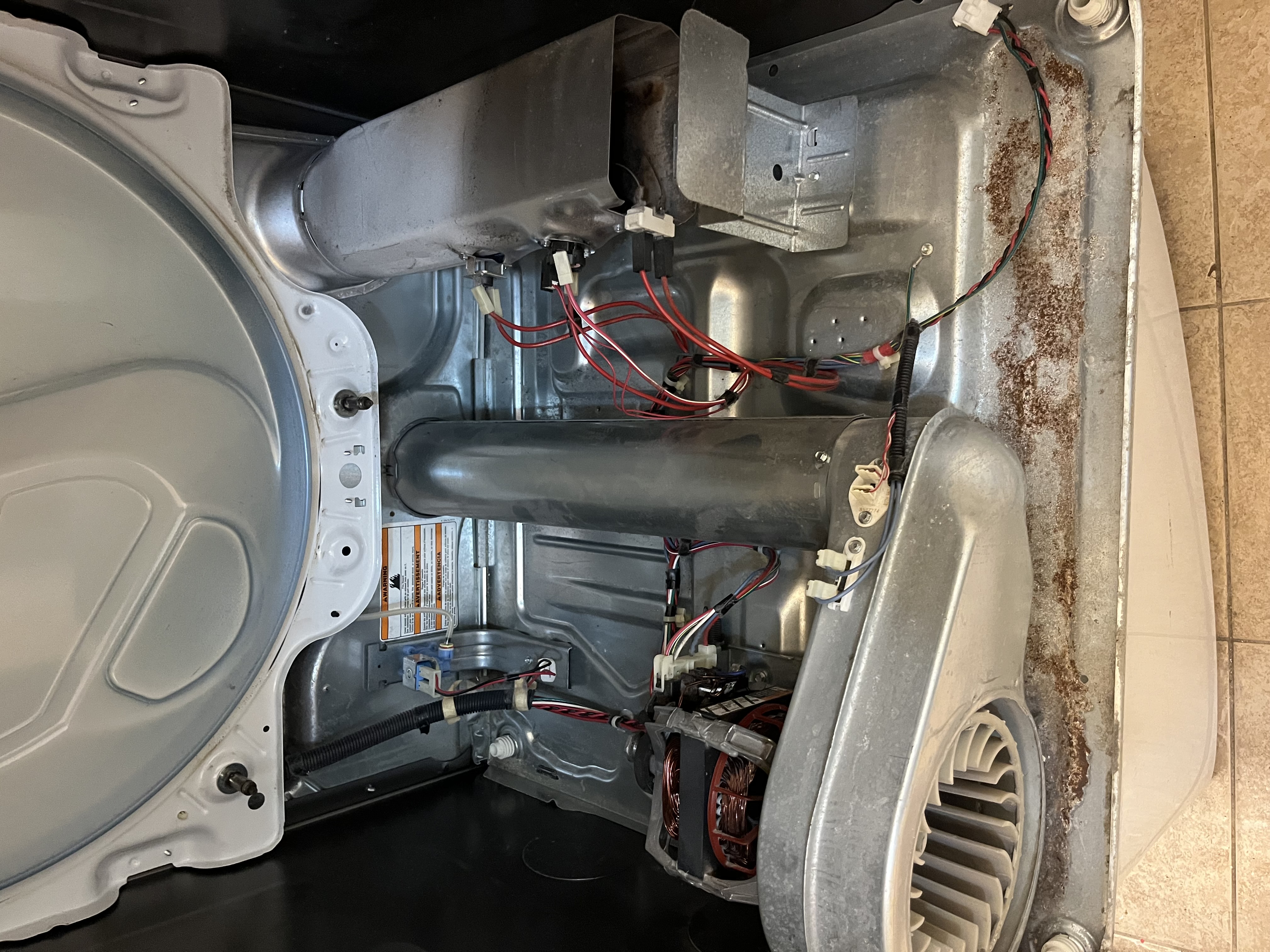 Real appliance repair service in progress