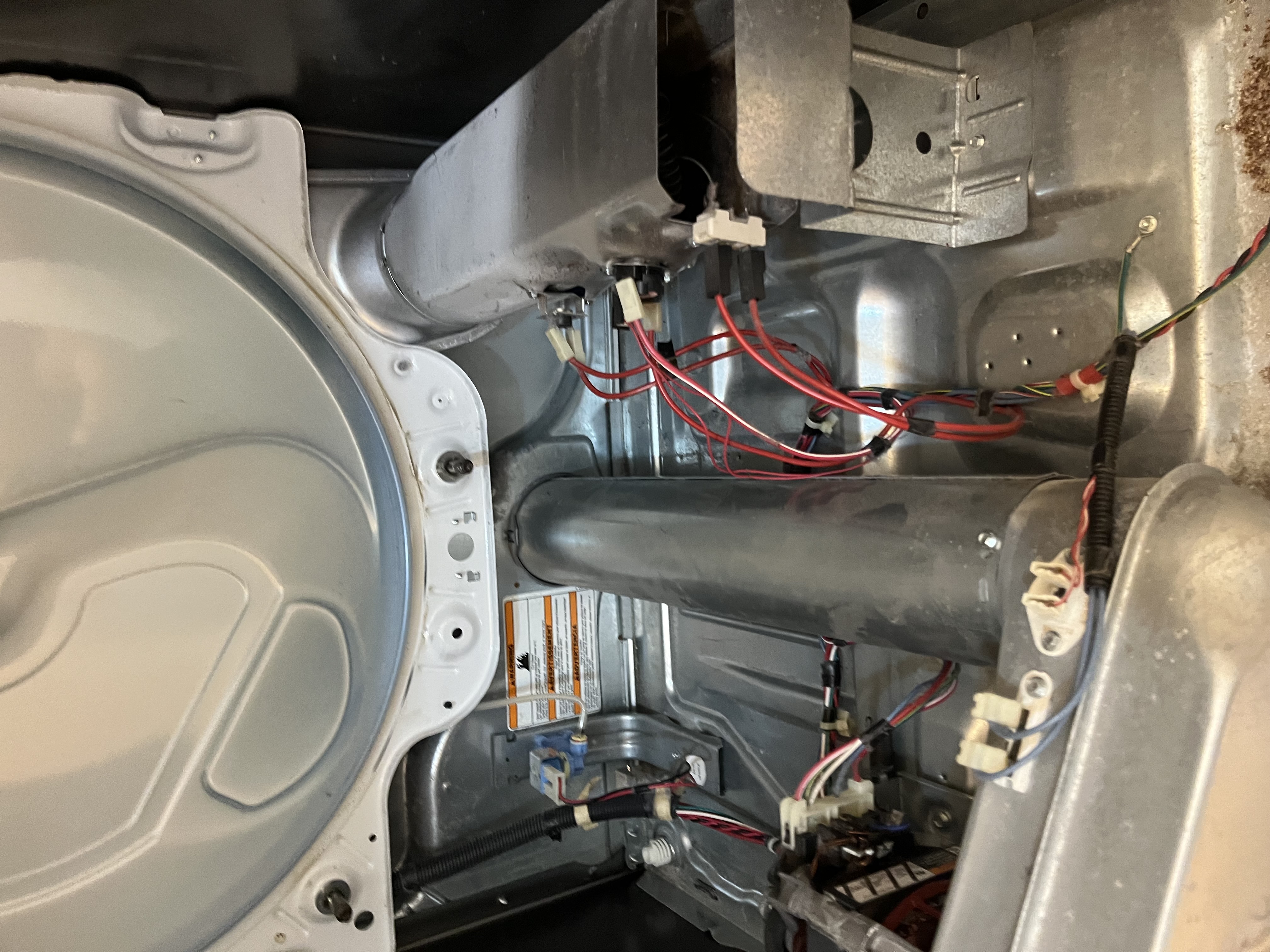 Dryer wiring and vent area during appliance repair